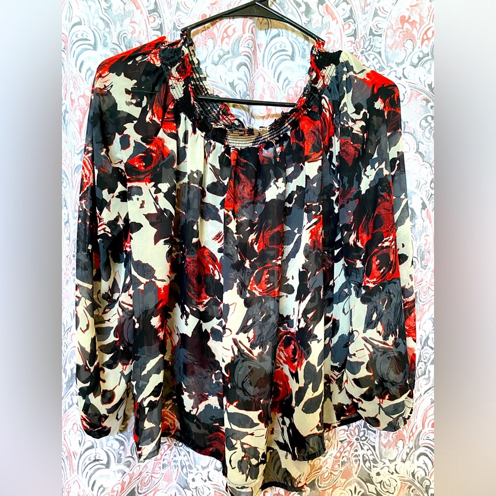 Sheer mid sleeve blouse with floral print size medium